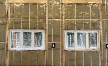 Rockwool batt insulation on a wall